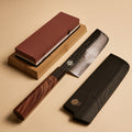 Nakiri starter kit contents — whetstone, knife, and wooden saya knife sheath